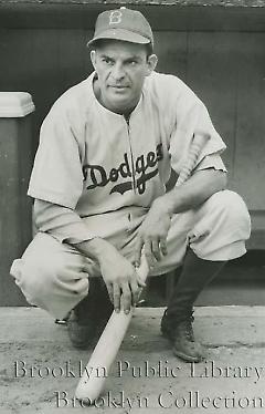 [Harry "Cookie" Lavagetto crouching with bat]