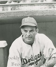 [Harry "Cookie" Lavagetto crouching with bat]