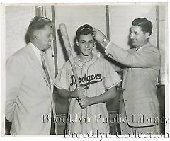 [Brooklyn Dodgers executives and player]