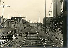 Cut looking east from 20th Ave. showing station concreting and underpinning of houses on south side right of way