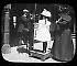 Views: U.S., Brooklyn. Brooklyn, Coney Island. View 009: Coney Island (girl getting weighed on boardwalk) 1900.