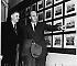 Walter Alston, new Brooklyn manager, shows President John D. Millett of Miami his 1934 Miami baseball team picture